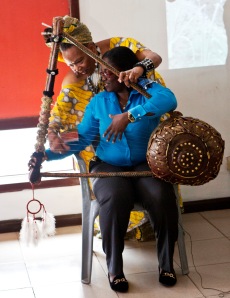 I love to share about the instruments that I play. Her showing a Ghanian sister about obokano